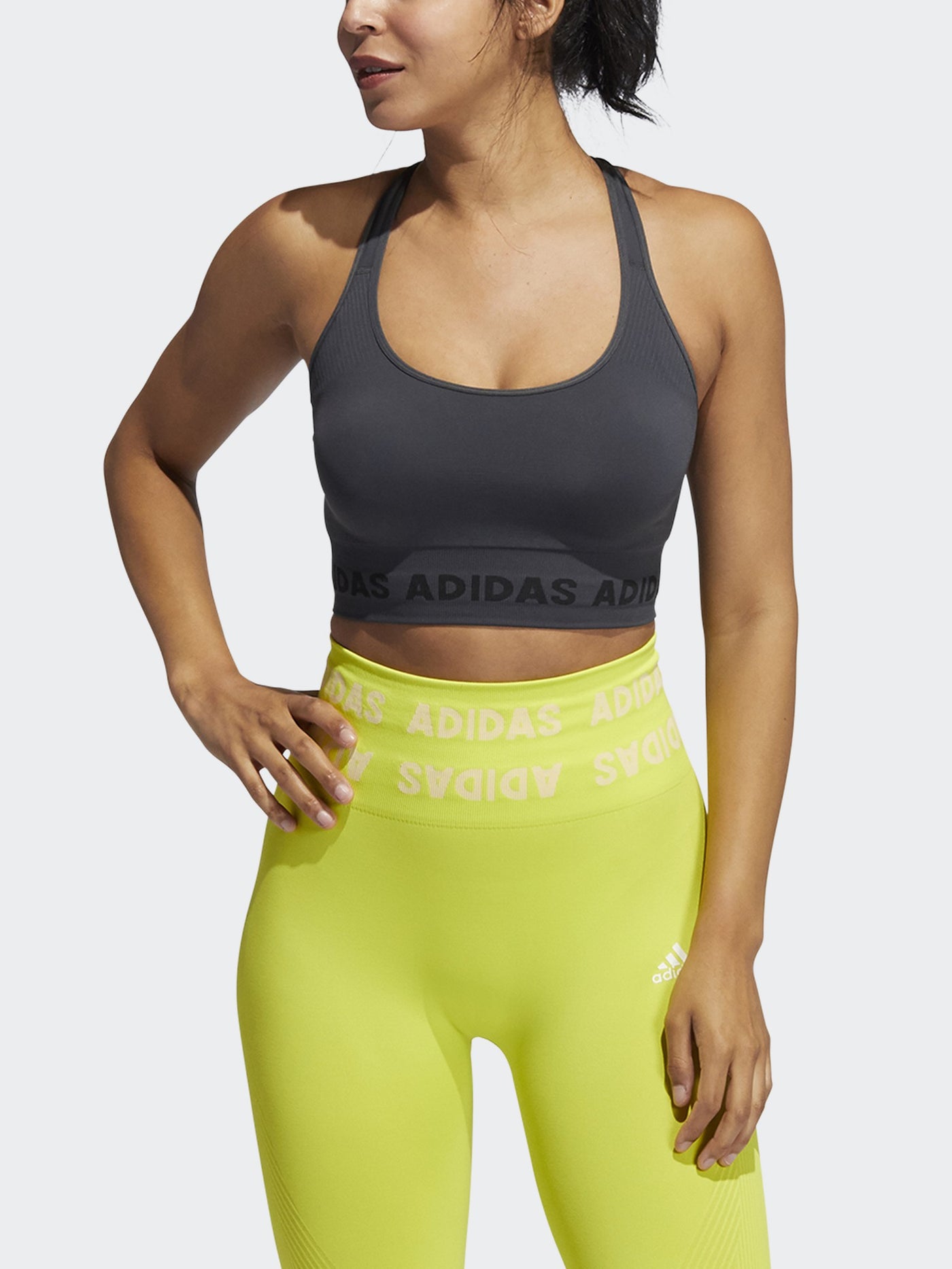 adidas Training Aeroknit seamless light support sports bra in yellow